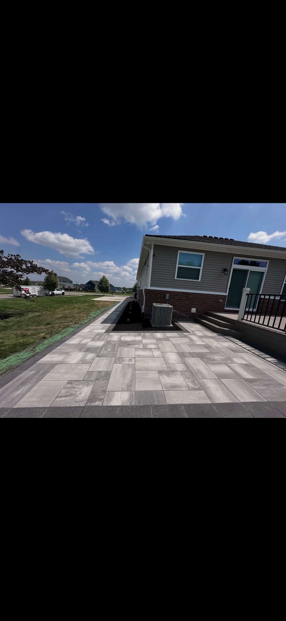 Lower-level brick paver patio Lower-level brick paver patio landscaping